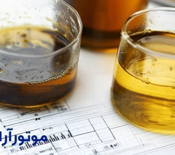 دو ظرف روغن موتور یکی شامل روغن موتور سالم و دیگری روغن موتور ناسالم